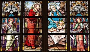 church stained glass window of baby Jesus