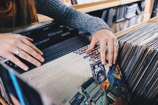 person looking through vinyl records