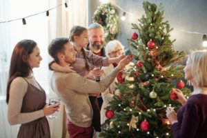 Family around the Christmas tree