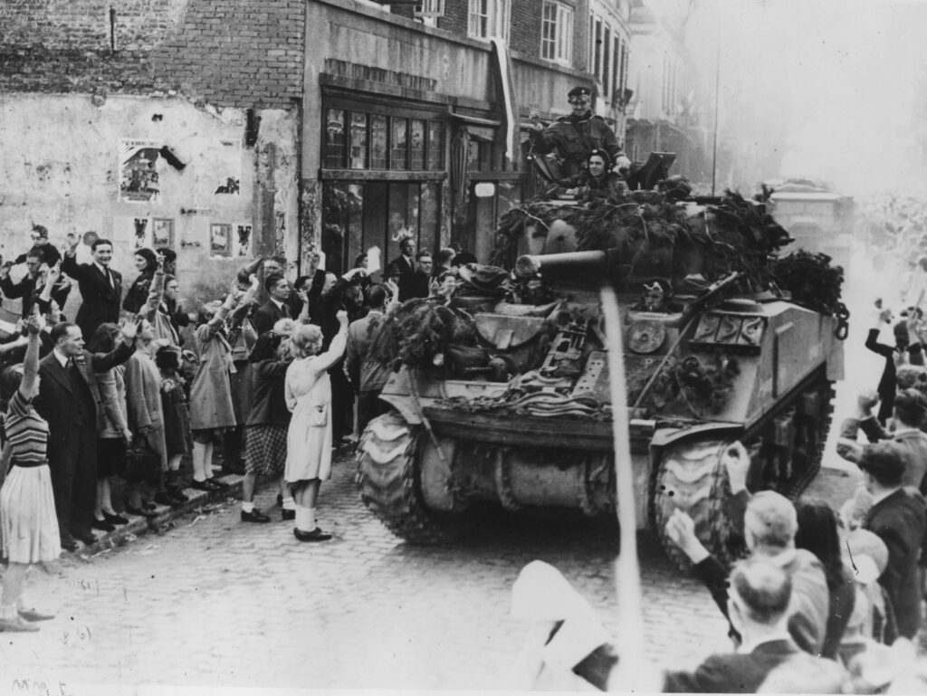 Soldiers Being Waved Off on a Tank