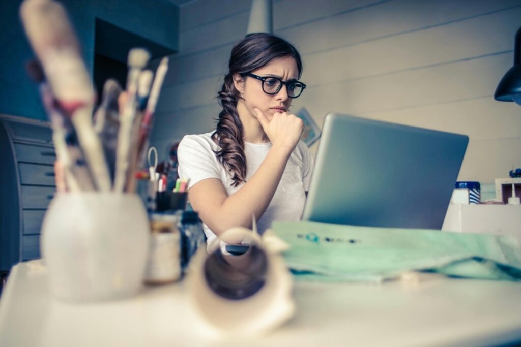 woman sat at a laptop