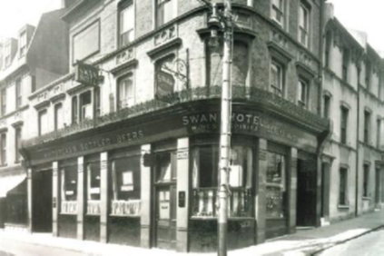 Black and white image of the Swan Hotel. 