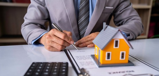 Yellow house on estate documents
