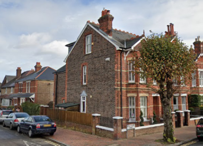 Modern house on the corner of the street.