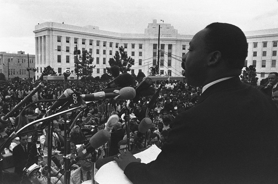 Martin Luther King Jr giving a speech