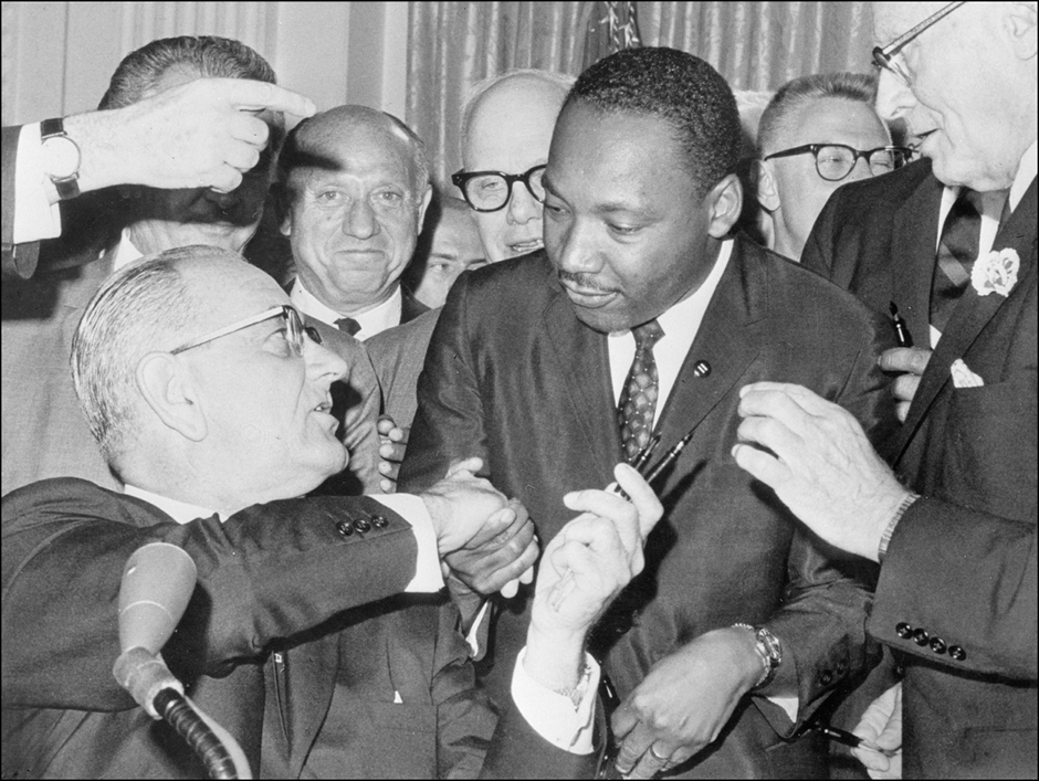 Martin Luther King Jr with Lyndon B. Johnson